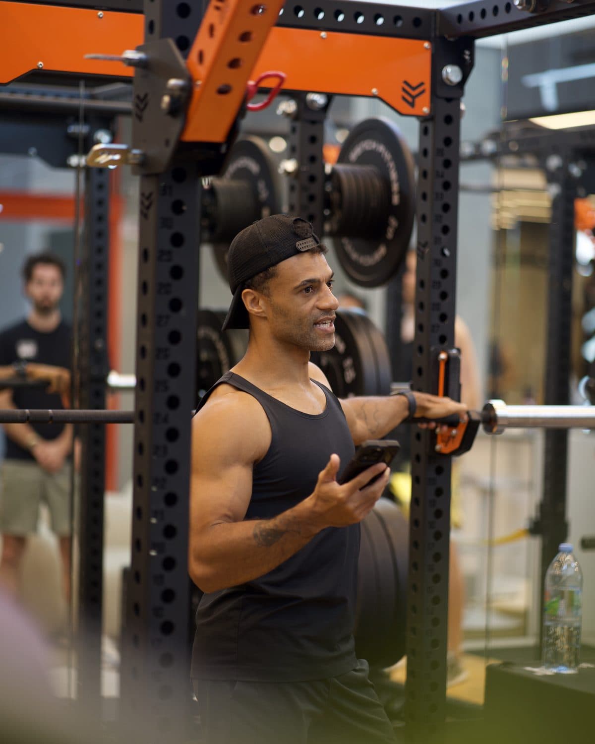 Personal trainer Kemo Marriott coaching at a gym in Bangkok
